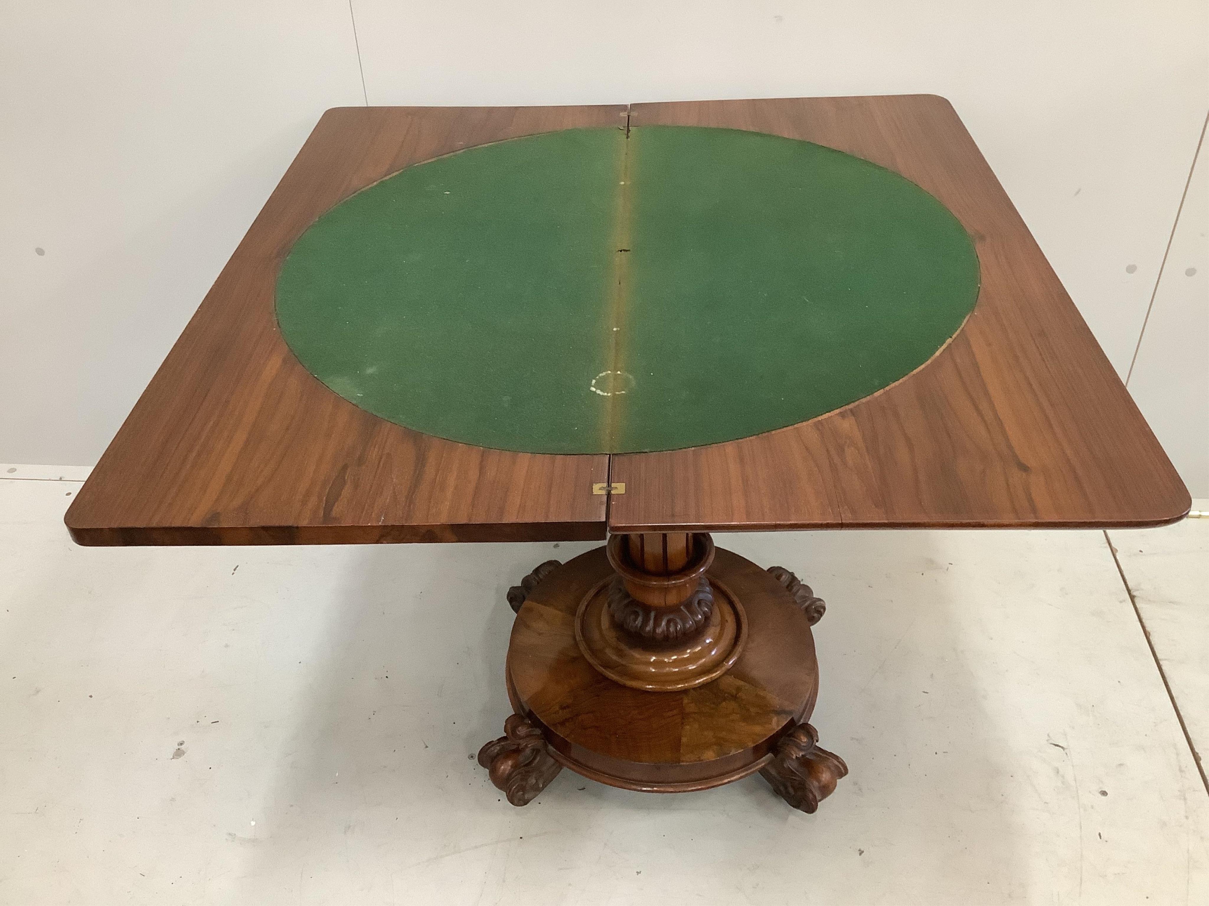 An early Victorian figured walnut rectangular folding card table, width 92cm, depth 44cm, height 77cm. Condition - fair